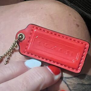 Coach red hang tag